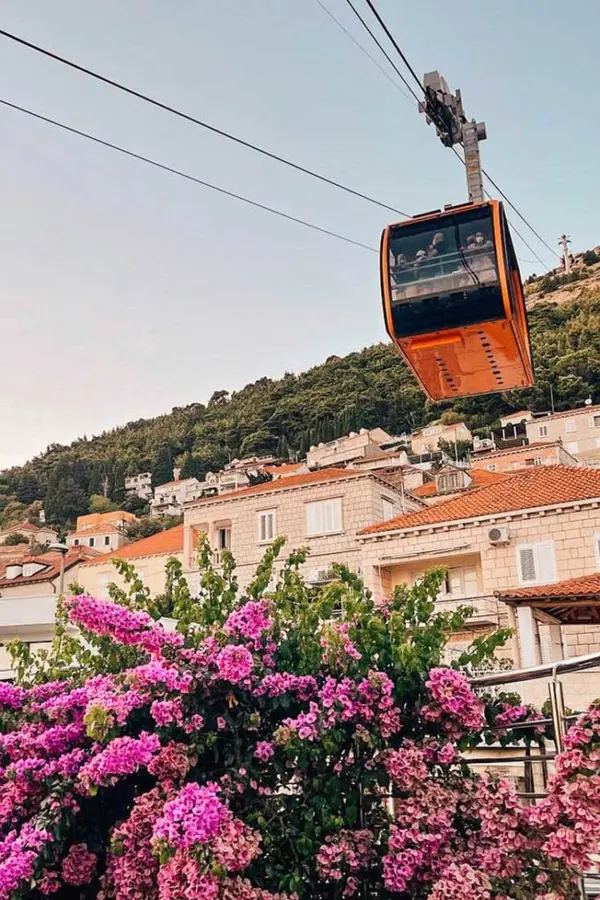 Dubrovnik cable car lower station with ticket windows and queue.