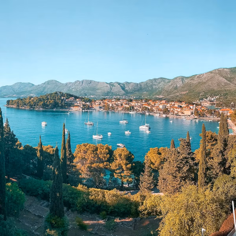 Aerial view of Cavtat village nestled on the Rat Peninsula, showcasing its Mediterranean charm and coastal beauty.