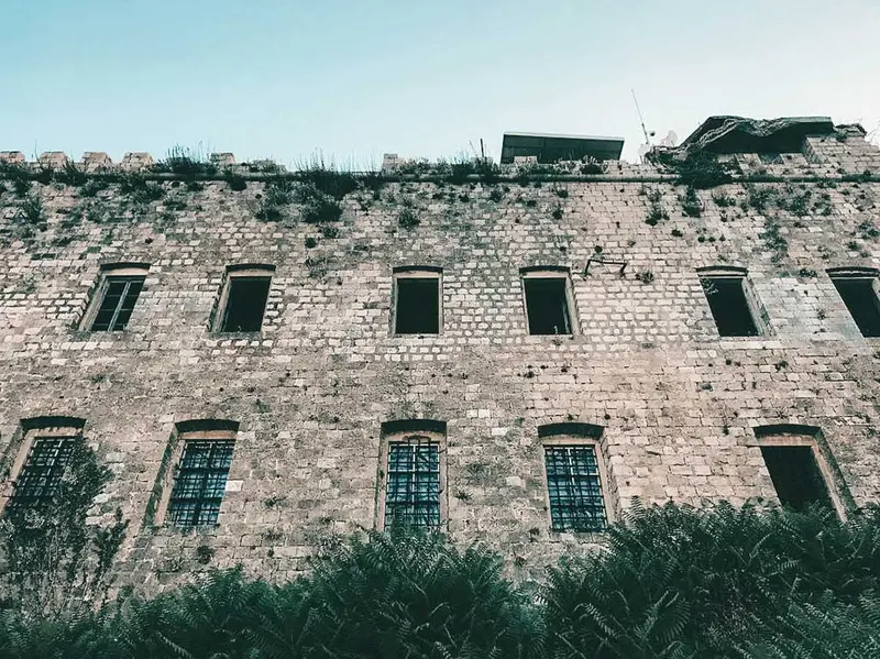Fort Imperial on Mount Srđ with the Croatian flag at the summit.