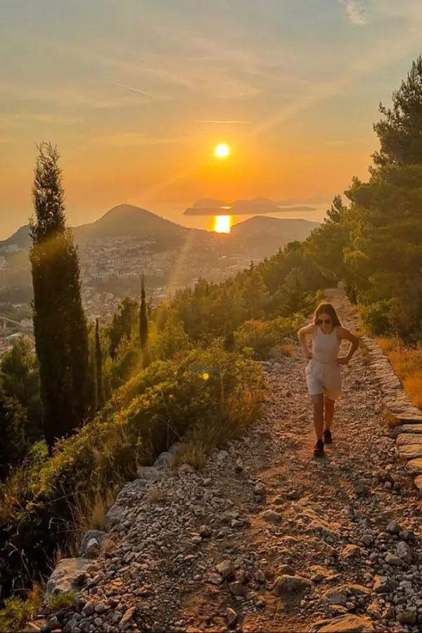 Person hiking the Hiking trail on the Srđ path