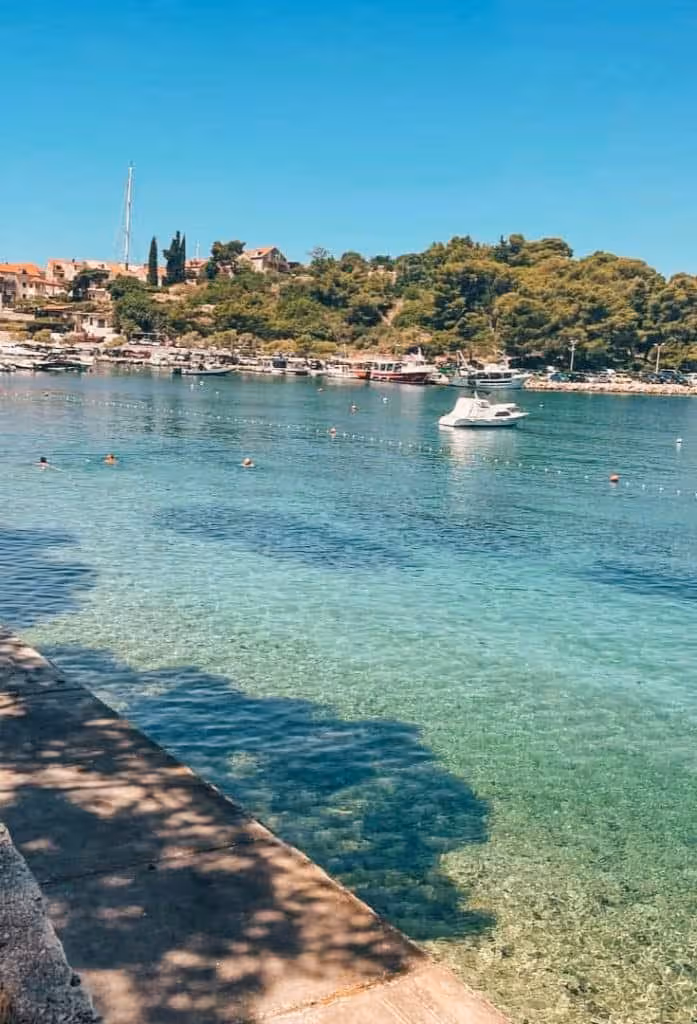 Cavtat Gradska Beach promenade and swimmers