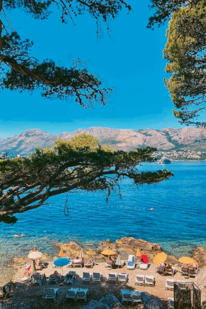 Ključice Beach Cavtat shaded by pine trees
