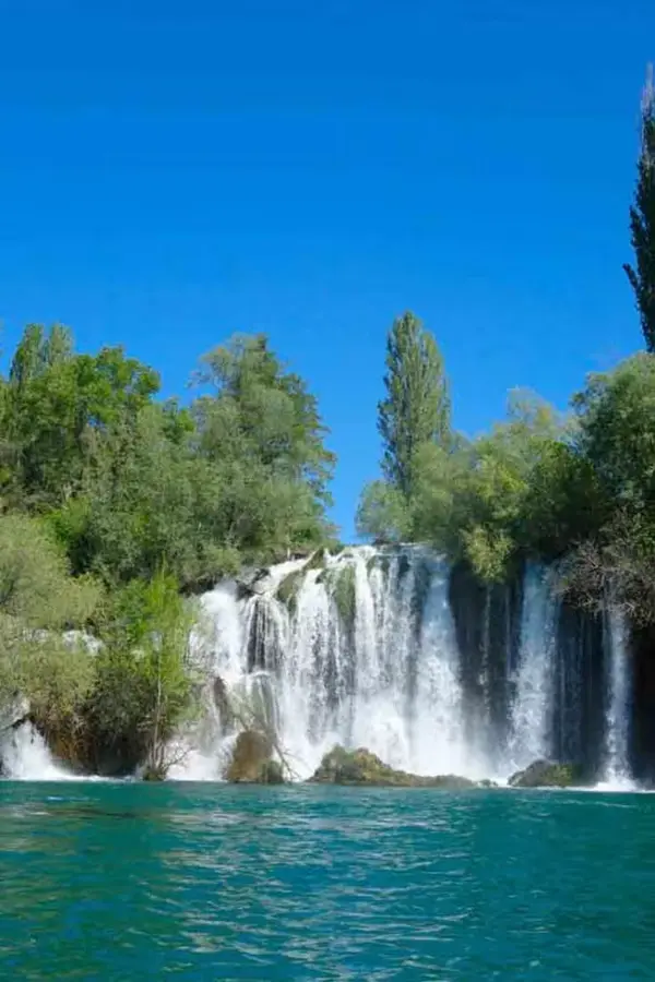 Roški Slap with emerald pools and travertine cascades in Krka NP.